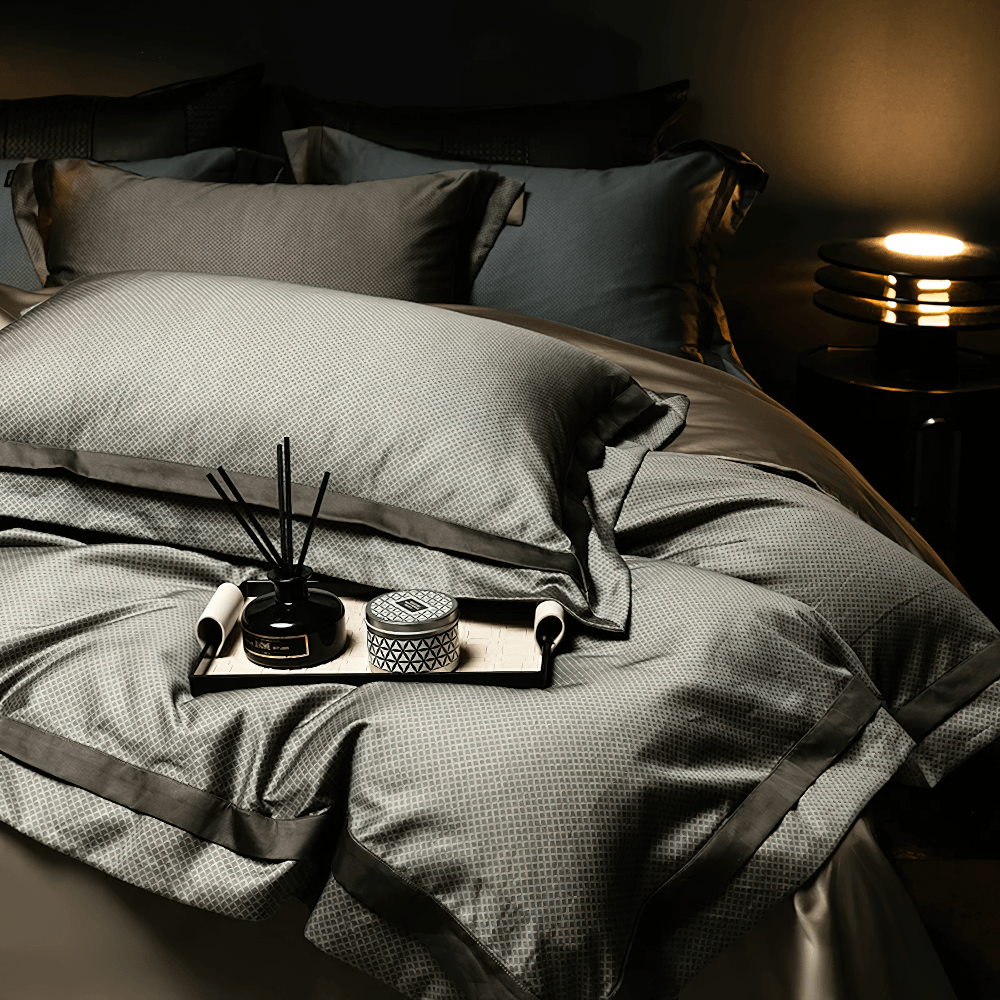 1000TC Egyptian Cotton Satin Bedding Set with Duvet on a stylish bed, featuring elegant textures and deep gray tones.