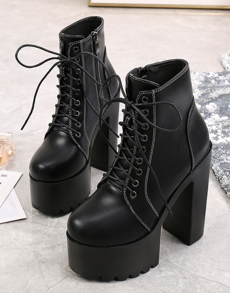 Stylish black high heel ankle boots with laces and zipper, perfect for gothic outfits and versatile wear.