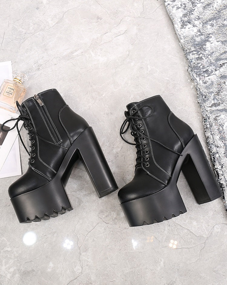 Stylish black high heel ankle boots with zipper and laces, perfect for gothic outfits and any occasion.
