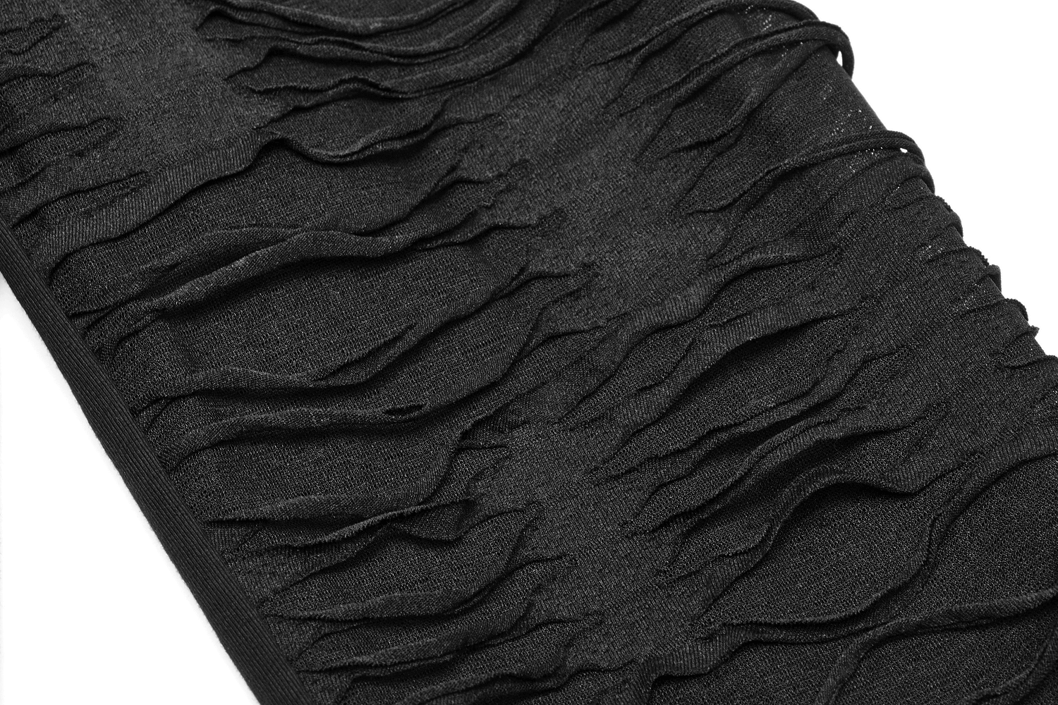 Close-up of black sweatshirt sleeve with unique ripped knit details for a punk style look.