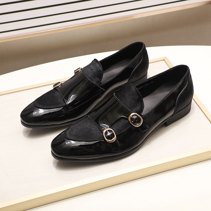 Stylish men's patent leather loafers with double buckle detail, offering casual elegance and refined coolness.