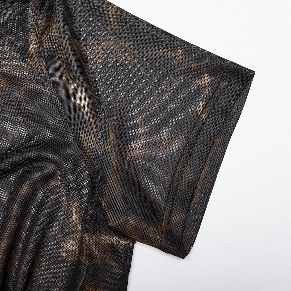 Close-up of abstract print stretch mesh tee showcasing intricate black and brown detailing and textured fabric.