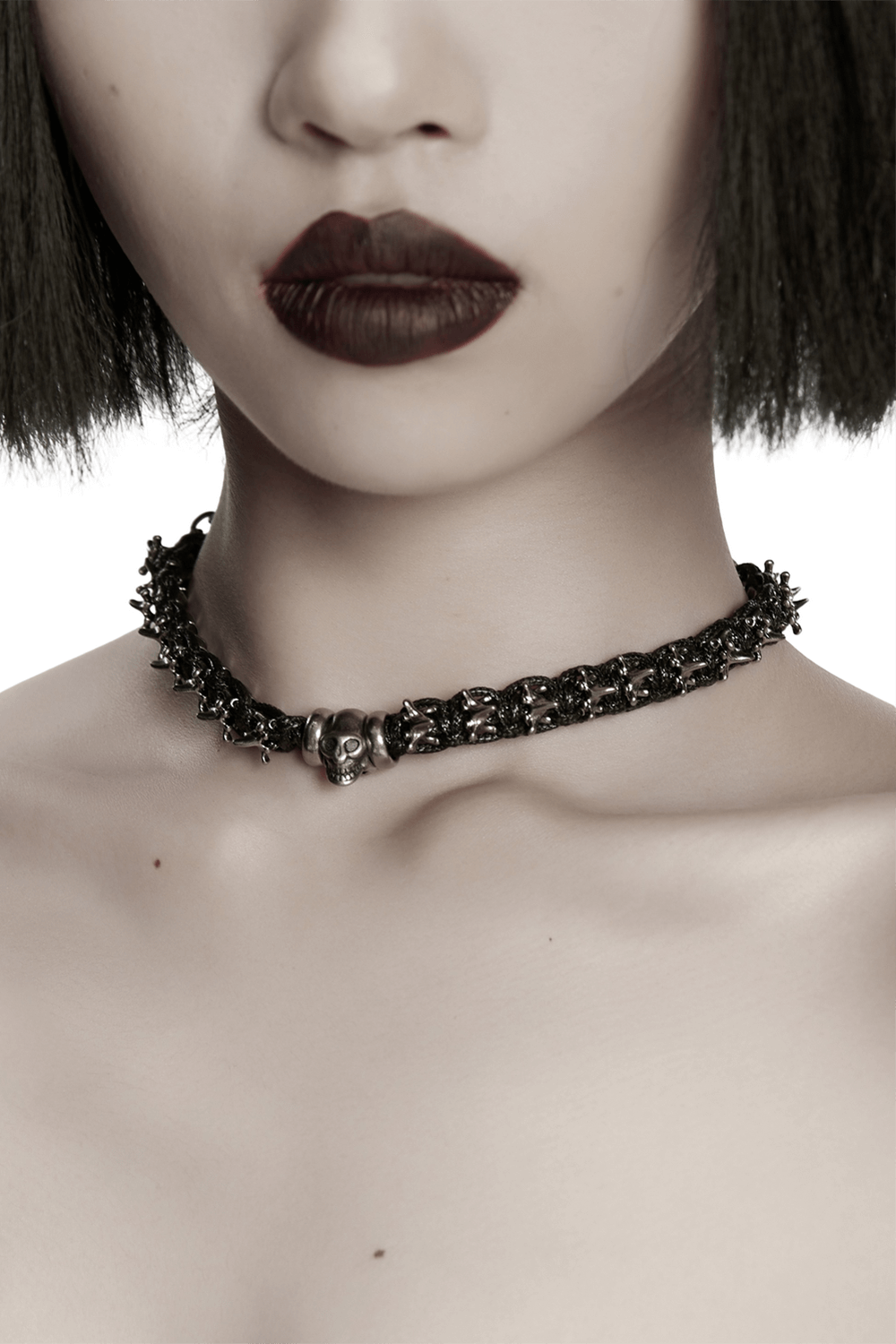 Adjustable Gothic Punk Necklace with Skull and Spine Beads worn by model showcasing a bold dark style.