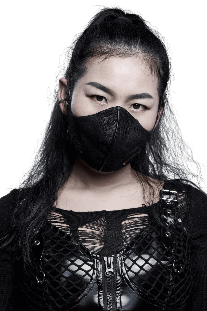 Model wearing an adjustable woven punk style face mask with a glossy finish and metal buckle detail.