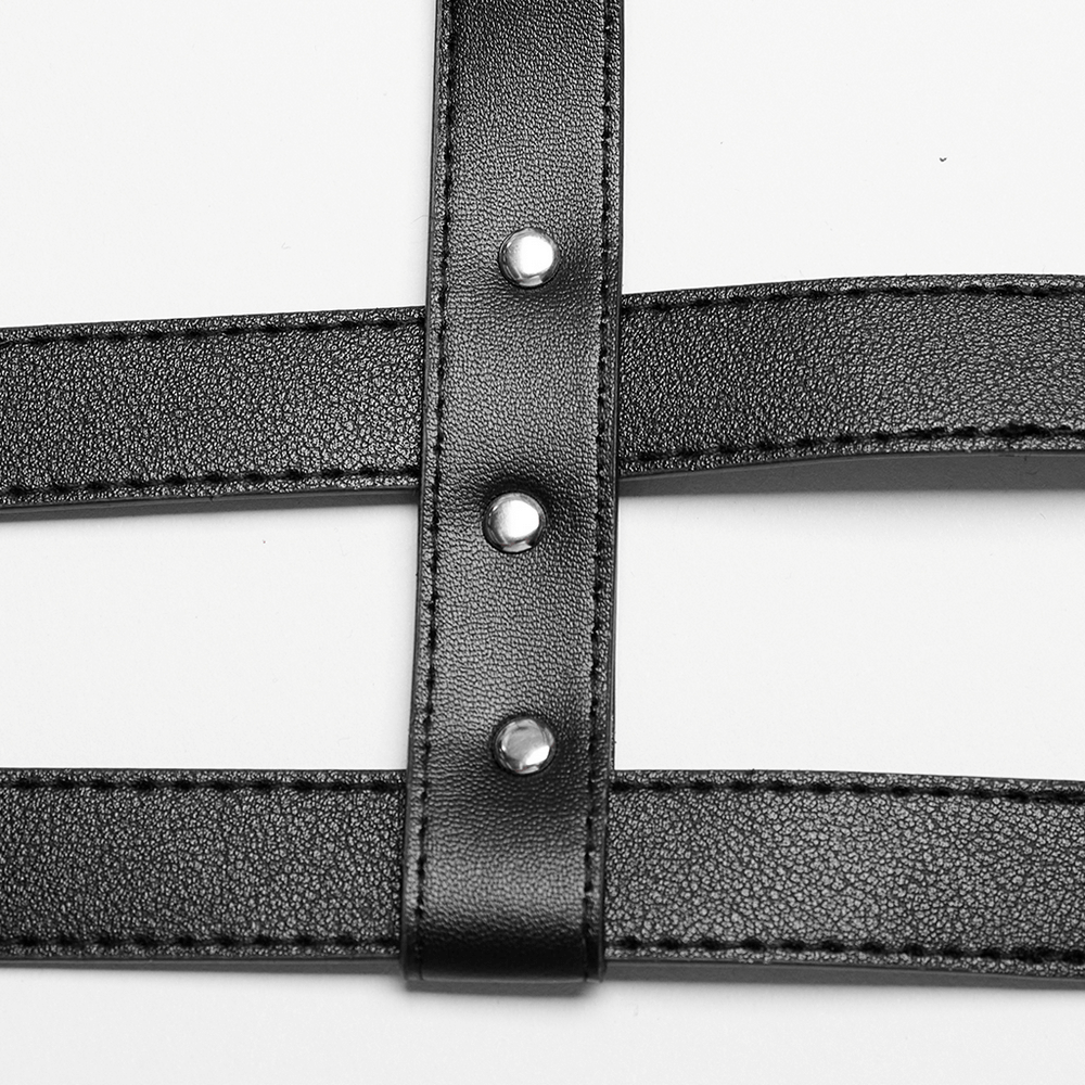 Close-up of adjustable black PU leather shoulder harness with silver studs.