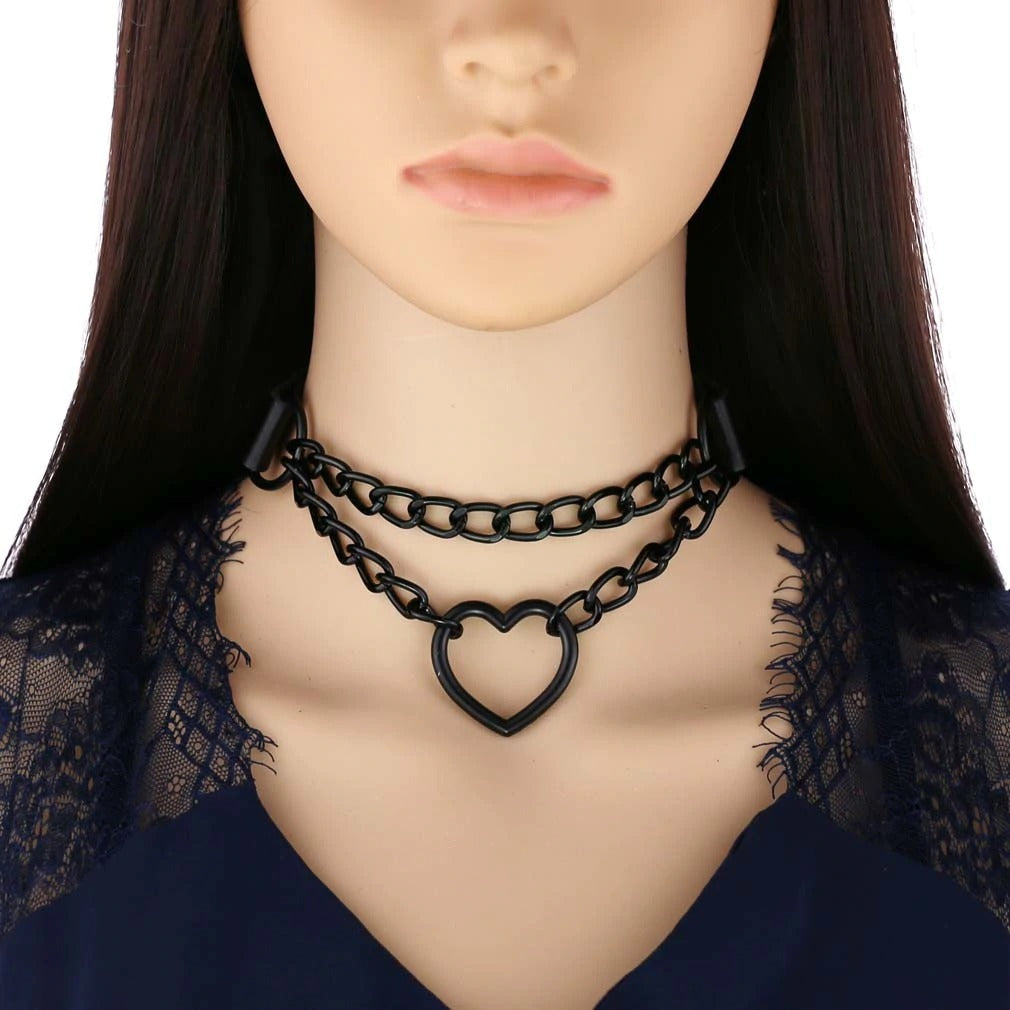 All black heart chain choker necklace on mannequin, gothic style for Halloween accessories, perfect for edgy outfits.