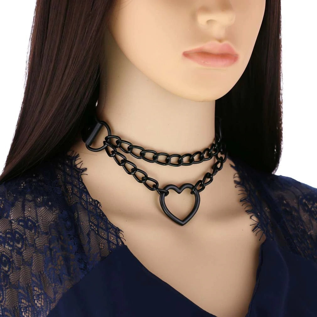 All black heart chain choker on mannequin, perfect gothic accessory for Halloween and stylish women's fashion.