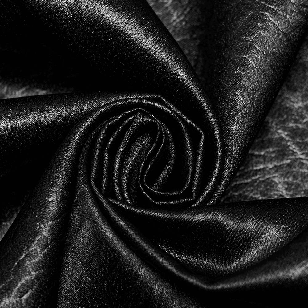 Close-up of crack-textured black fabric, ideal for gothic and alternative fashion styles.