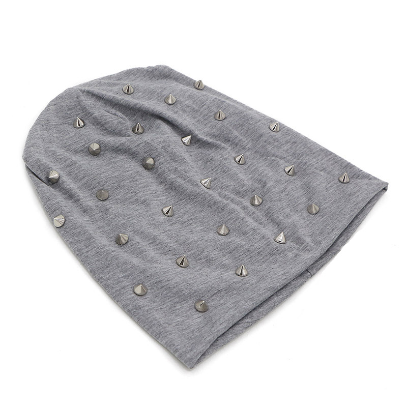 Rock & metal style beanie hat with spikes, perfect for a bold fashion statement in winter or autumn.