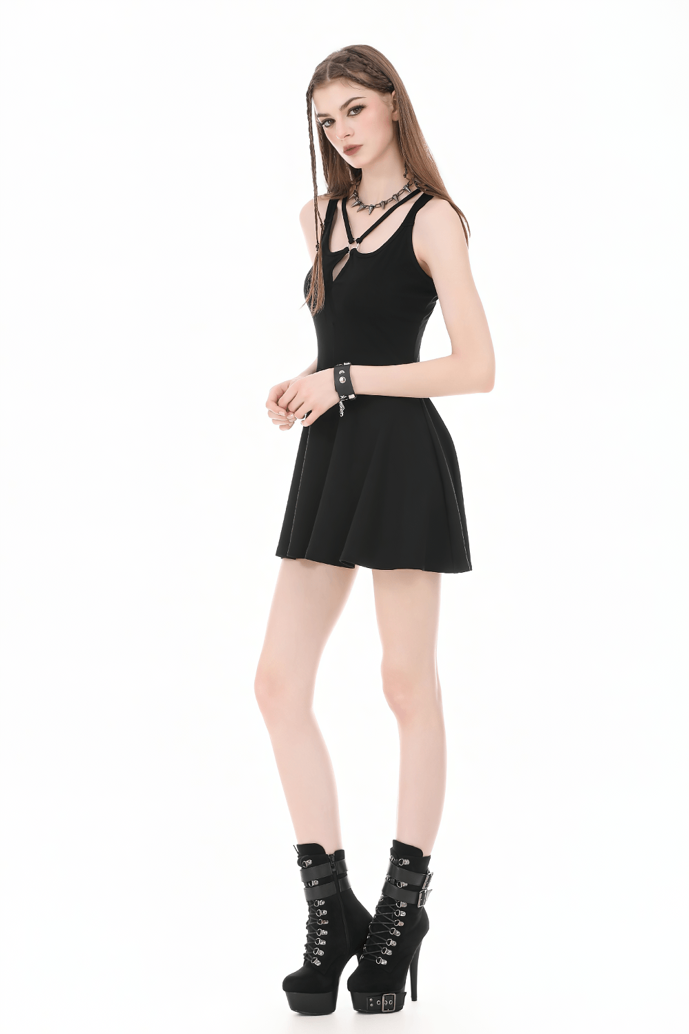 Alternative Halter Mini Dress with Cross Strap Neckline worn with platform boots and accessories.