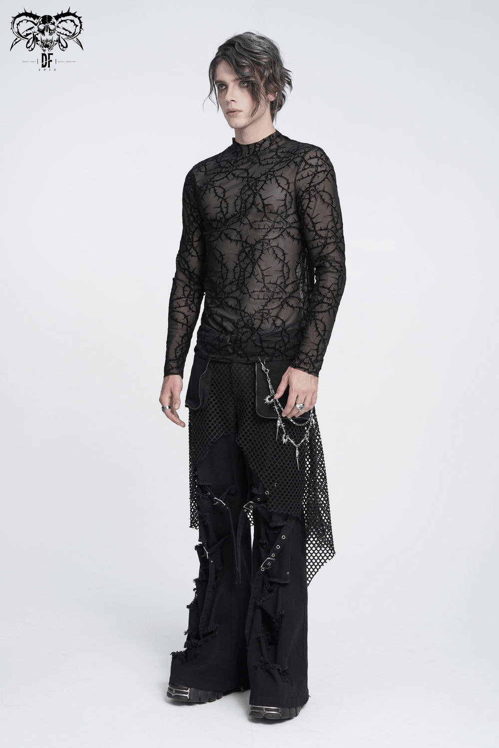Alternative Sheer Mock Neck Top with Barbed Vine Pattern worn by a model in edgy black outfit.