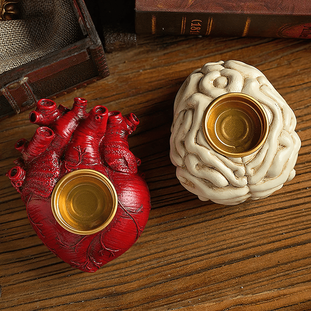 Anatomy Candle Holder for Gothic Horror Decor featuring heart and brain designs with gold candle inserts.