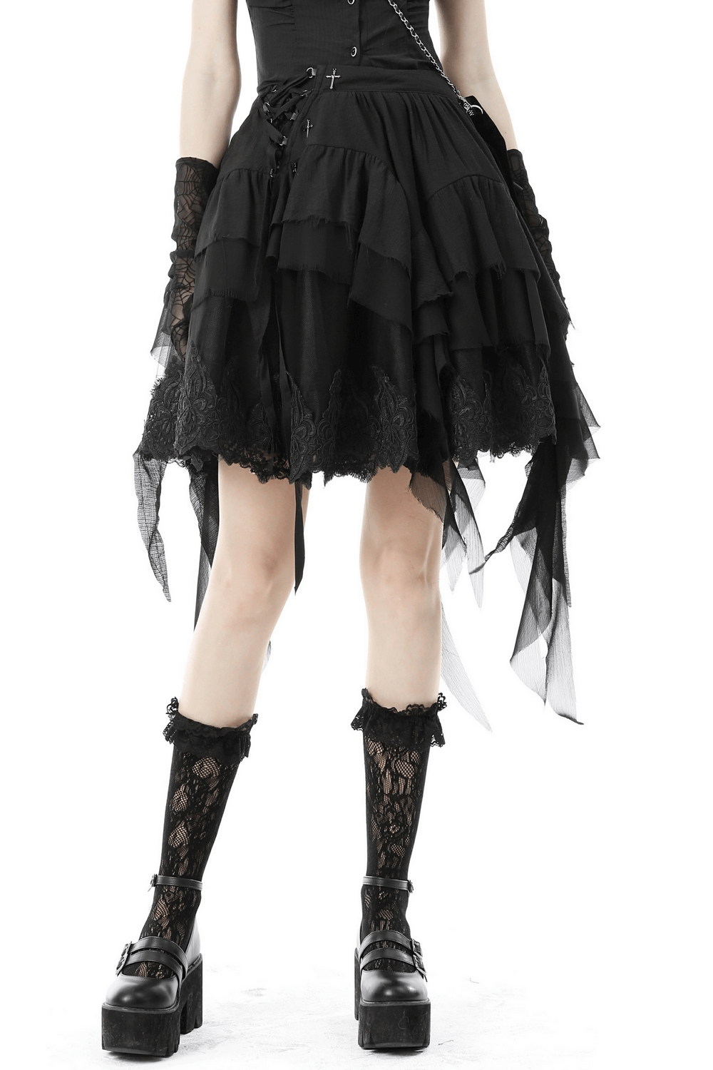 Asymmetric layered ruffle skirt for punk and festival looks, featuring dramatic handkerchief hem and lace details.