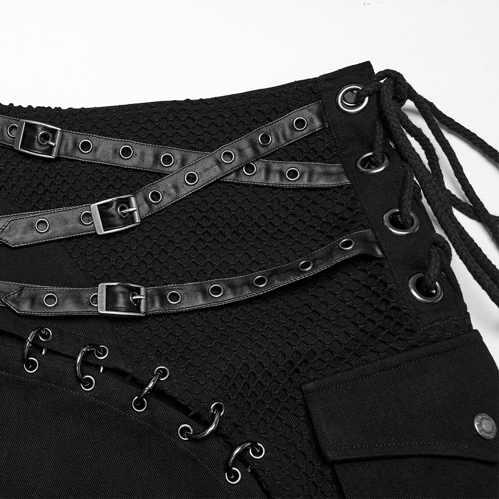 Close-up of asymmetric male gothic skirt with metal snap accents and stylish lace-up details.