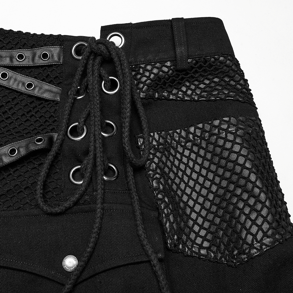 Close-up of an asymmetric male gothic skirt featuring metal snap accents and mesh details for a bold style.