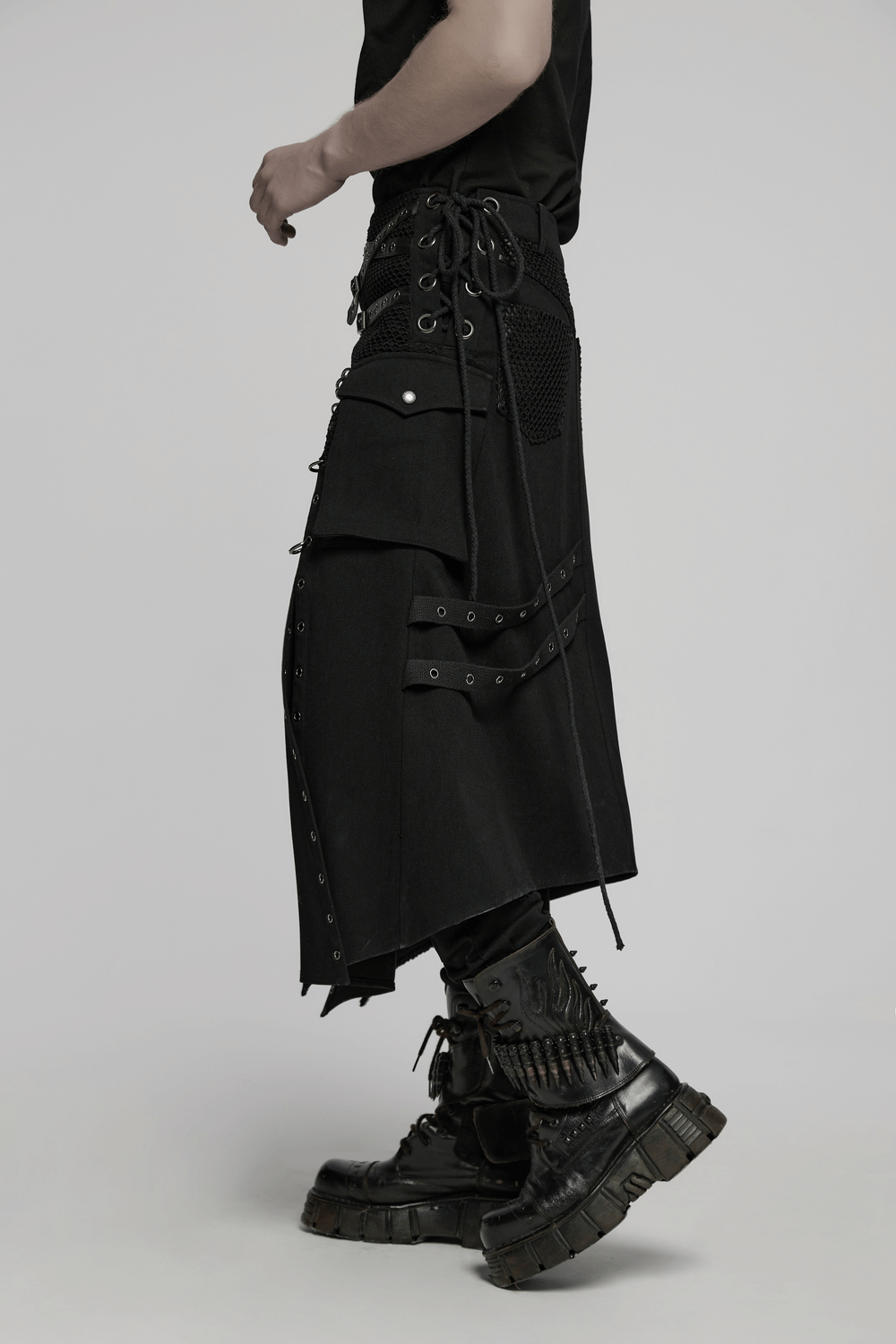 Asymmetric male gothic skirt featuring metal snap accents and stylish lace-up details, perfect for edgy fashion.