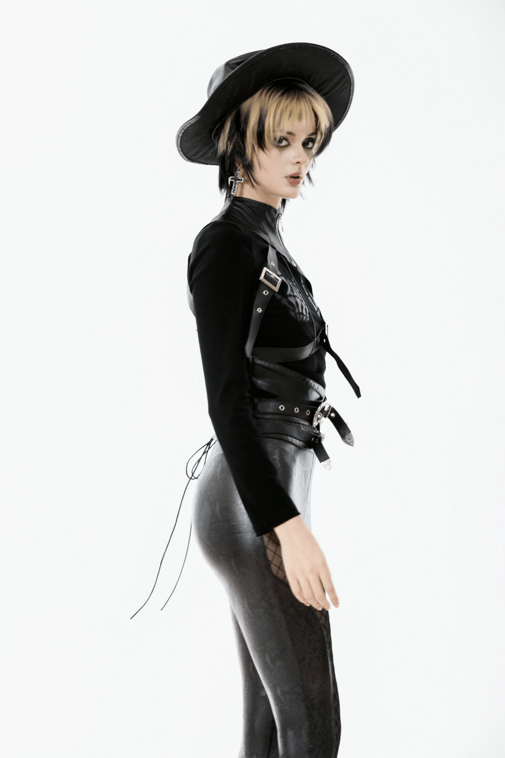 Asymmetric Punk Leather Shoulder Cape with Strap Detailing styled with edgy fashion accessories.