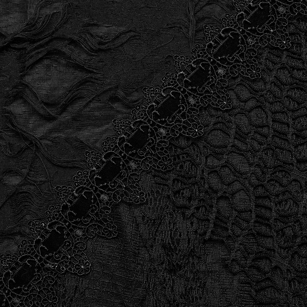 Close-up of black ripped mesh and lace fabric textures for a gothic chic aesthetic.