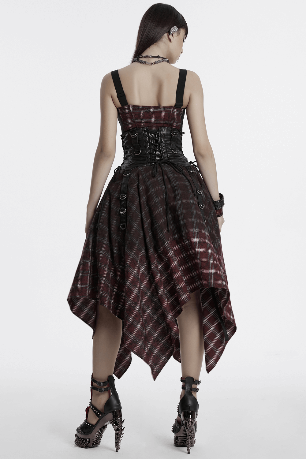 Back view of asymmetrical Gothic plaid skirt with zipper, showcasing its edgy design and unique pointed hem.