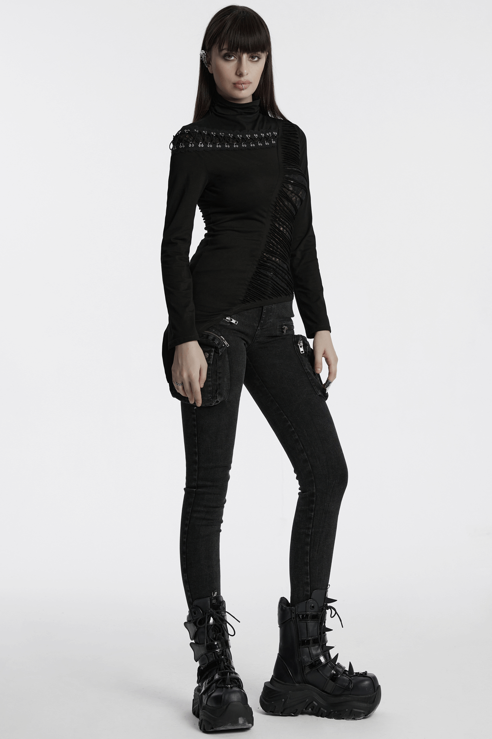 Asymmetrical punk mesh sweatshirt with metal details, showcasing a bold look with unique cuts and edgy accessories.
