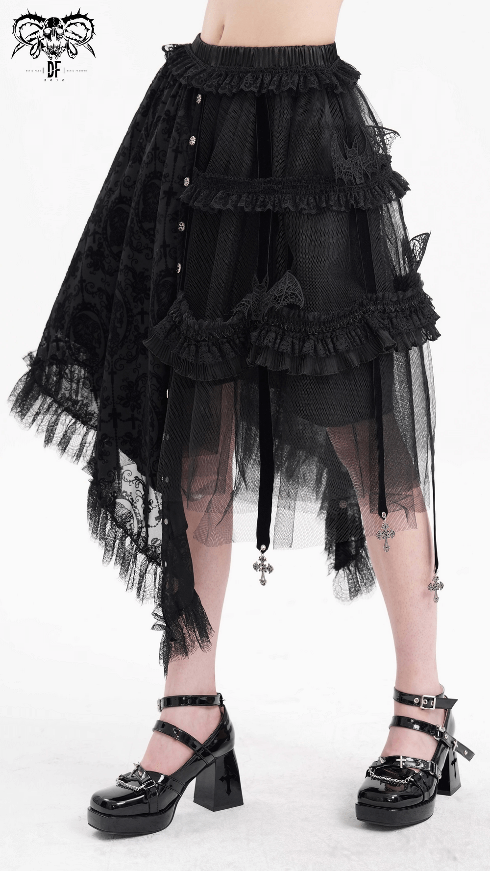 Elegant asymmetrical gothic skirt with bat wing accents and cross charms, perfect for alternative fashion.