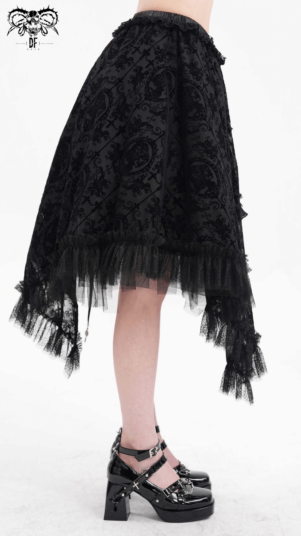 Asymmetrical gothic skirt with bat wing accents and lace details in elegant black design.