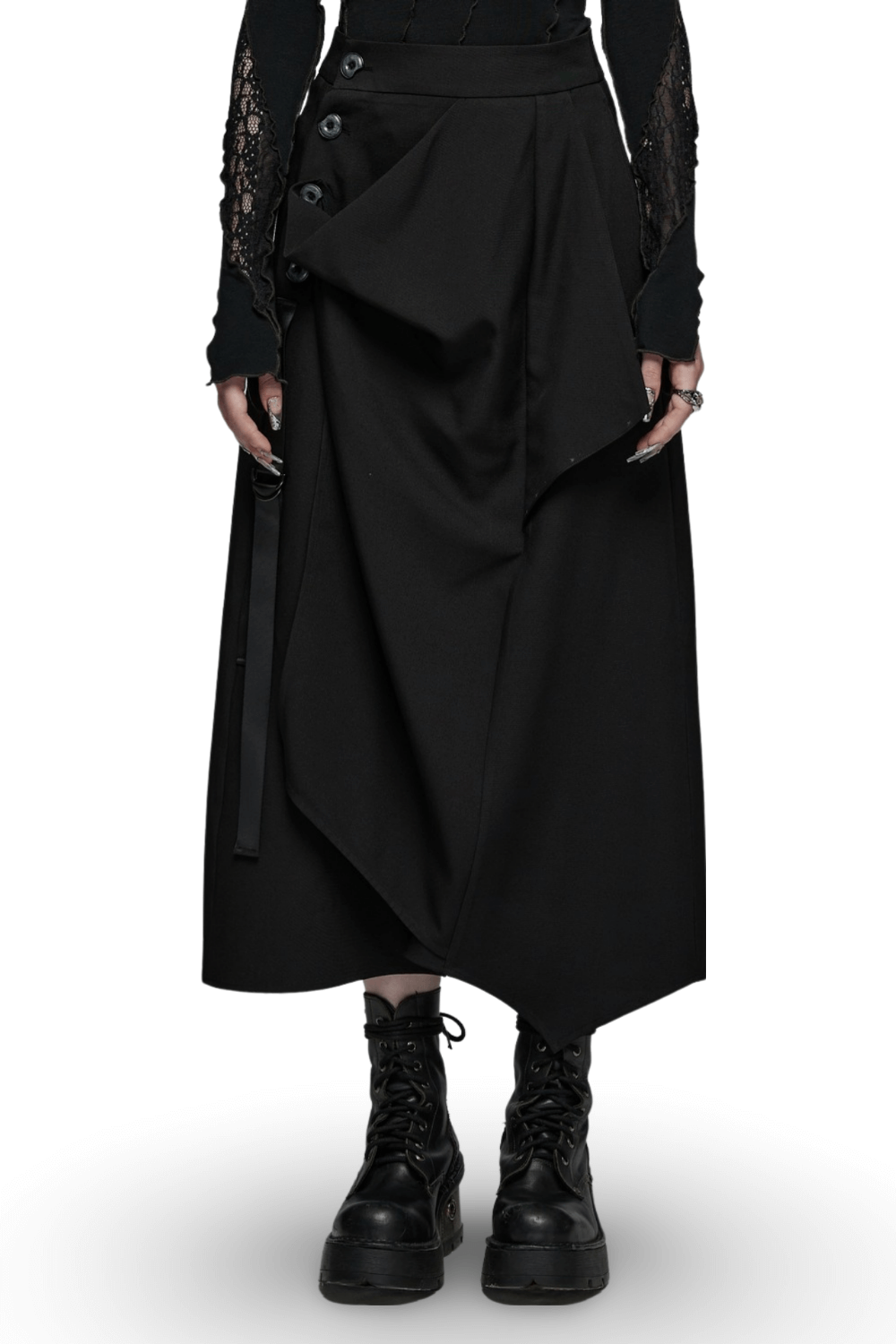 Avant-garde asymmetric draped skirt with buckle detail, styled with edgy black boots.