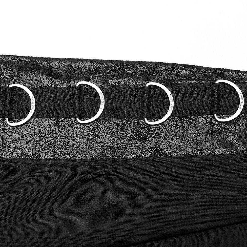 Detail of D-ring accents on Avant-Garde Black Hoodie showcasing unique faux leather texture.