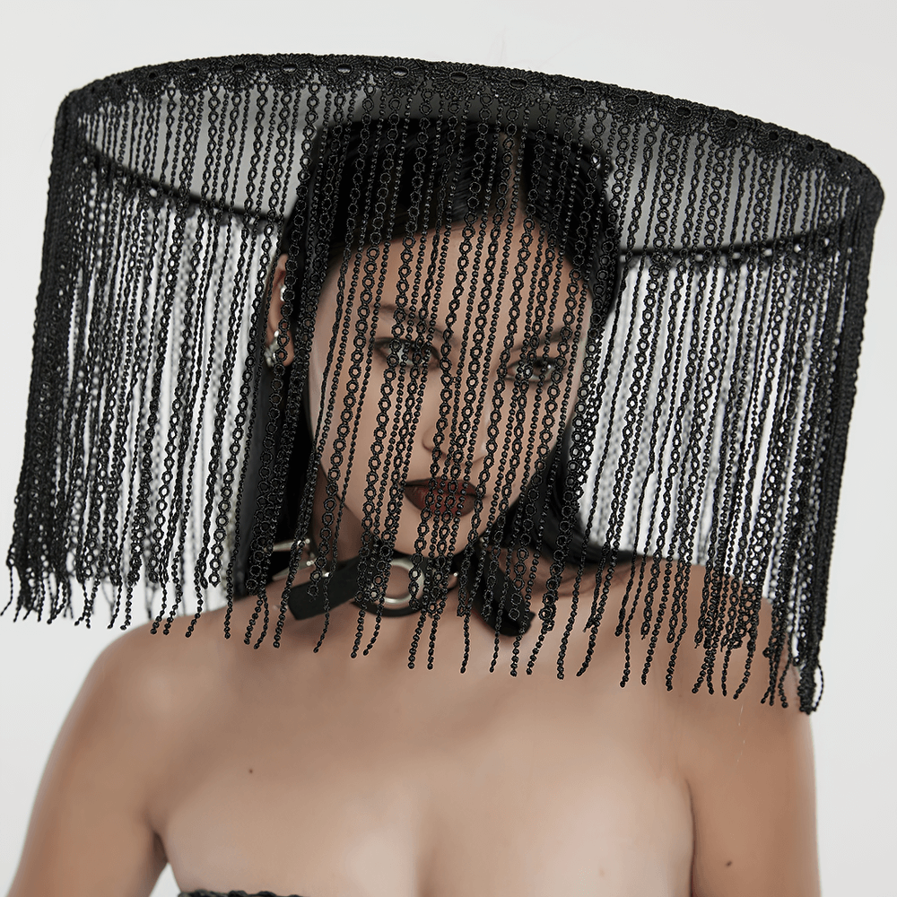 Striking black mesh hat with long fringe accents, exuding a bold and dramatic fashion statement.