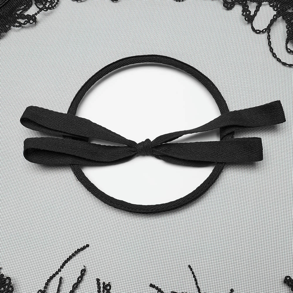 Adjustable black ribbon tie on a bamboo mesh hat, adding style and security to your look.