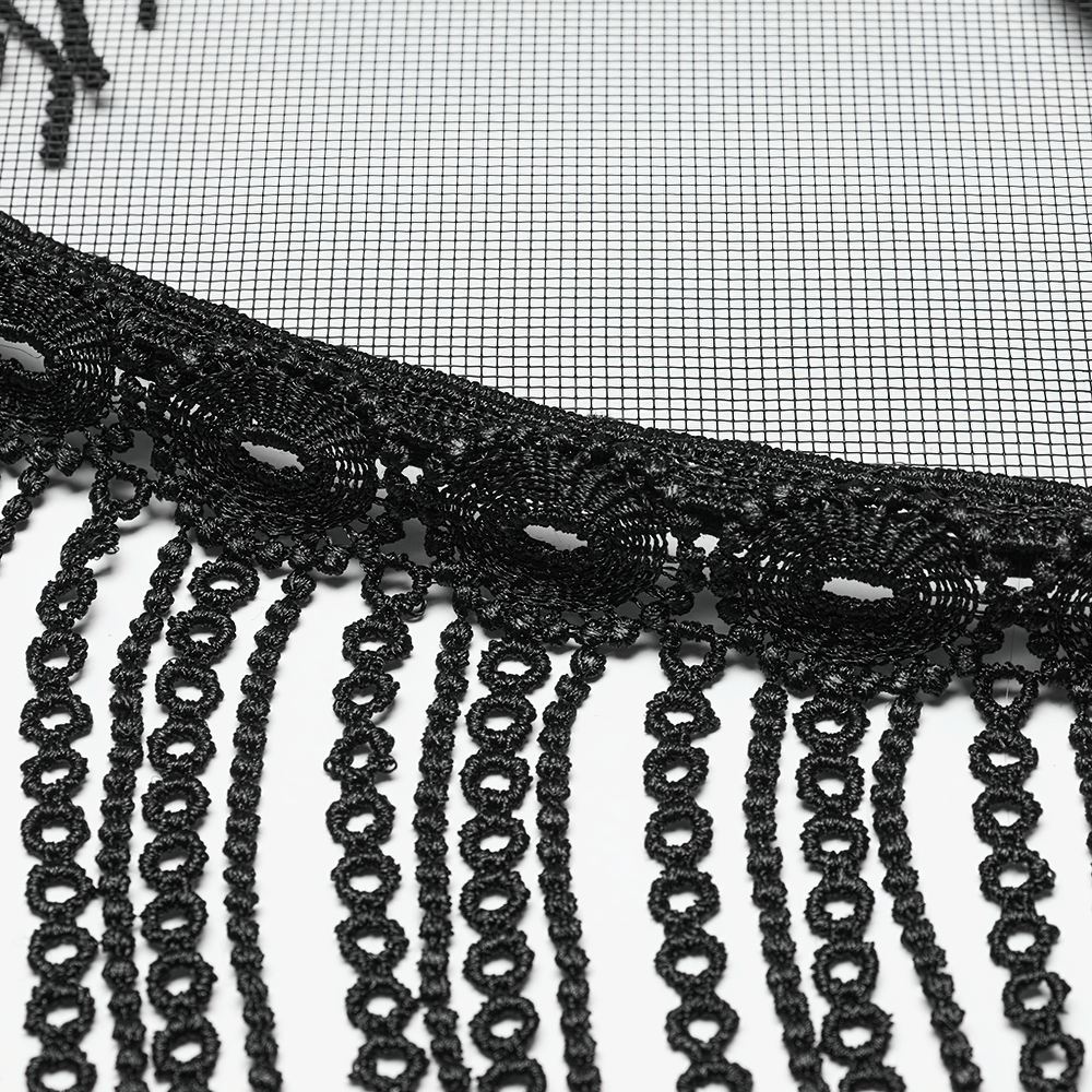 Close-up of black lace trimming with tassels, featured on a mesh bamboo hat for a stylish accessory.