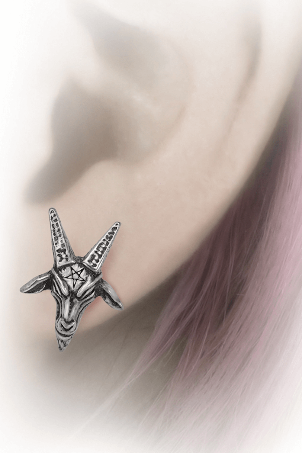 Baphomet goat head stud earrings with pentagram details, perfect for occult-inspired fashion.