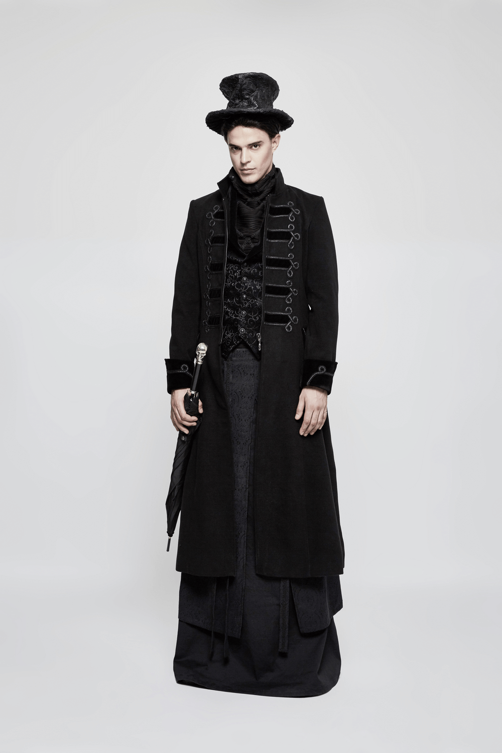 Model wearing a Baroque Black Jacquard Steampunk Tailored Waistcoat with elegant long coat and top hat.
