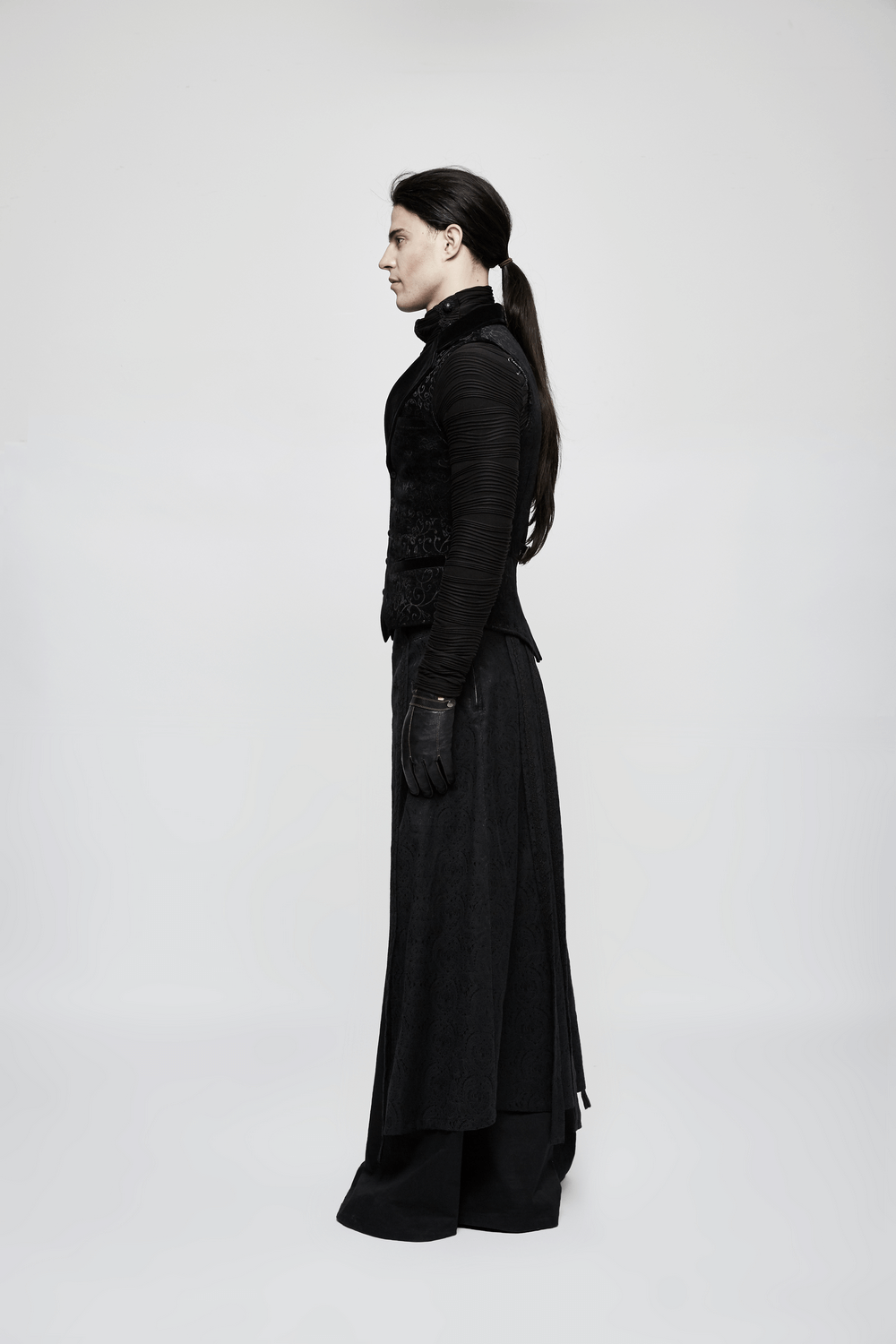 Profile view of a person wearing a Baroque Black Jacquard Steampunk Waistcoat with a sleek design.