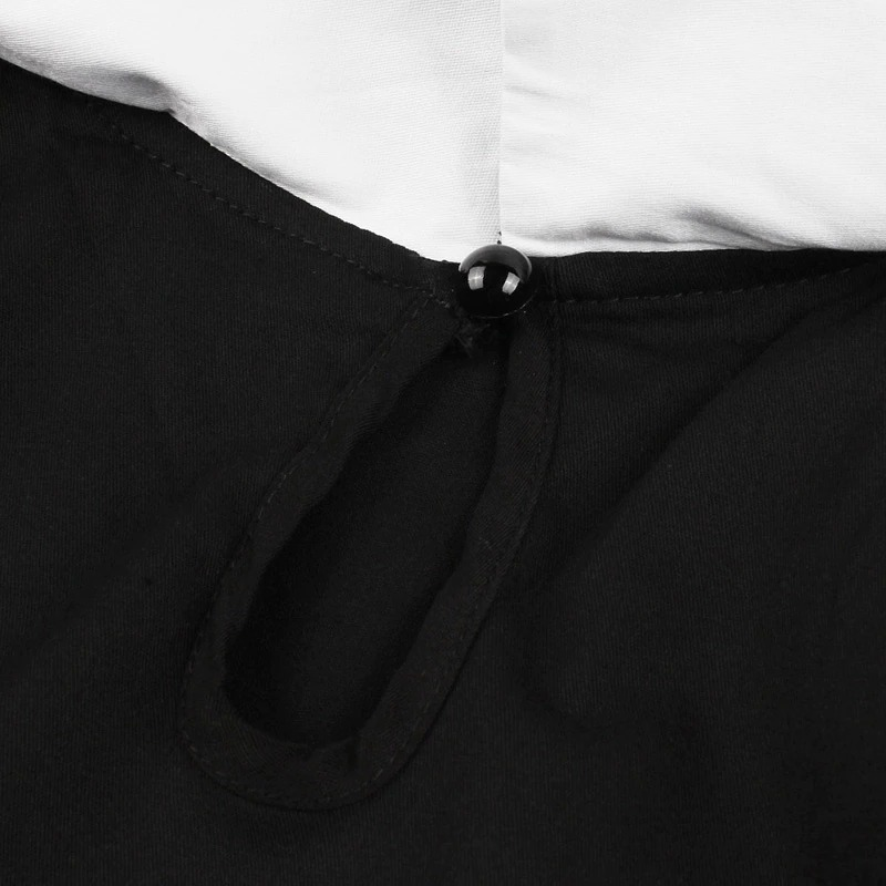 Close-up of the button closure and loop detail on a gothic black dress, perfect for stylish Halloween outfits.