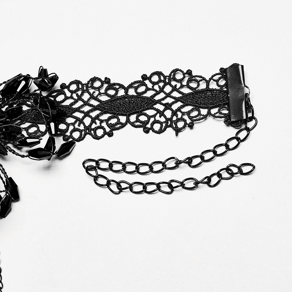 Close-up of a beaded spiderweb lace choker with blood drop details, showcasing its intricate design and gothic style.