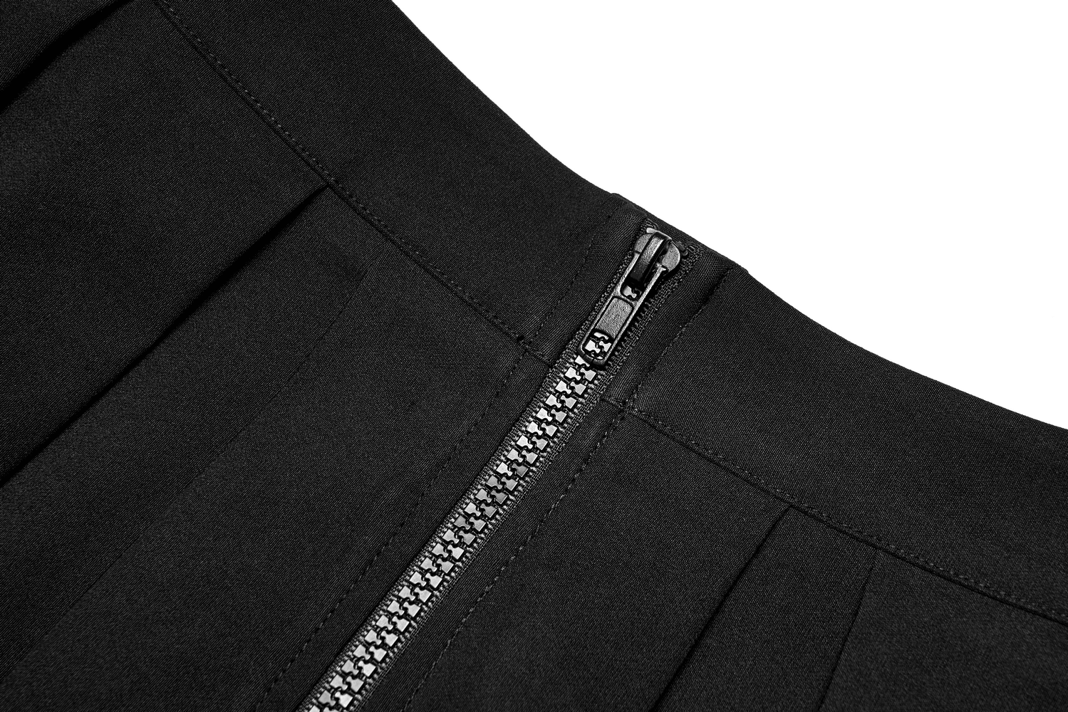 Close-up of the zipper detail on a black A-line pleated skirt with stylish lace accents and a metal buckle.