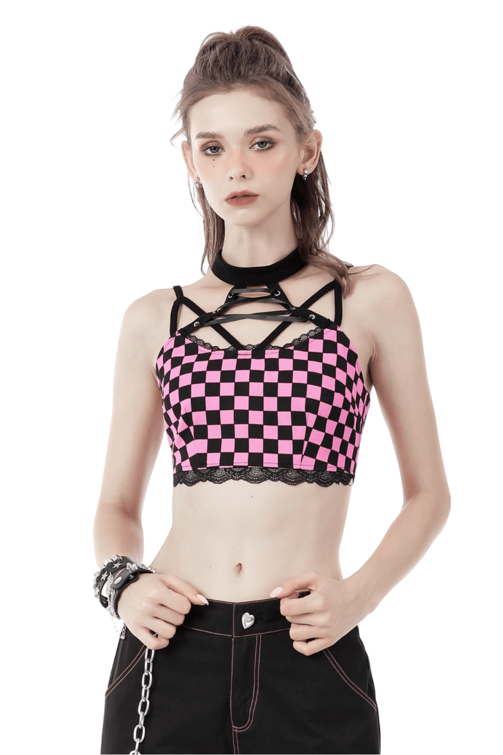 Edgy black and pink checkered halter crop top with strappy design, perfect for music festivals and stylish outfits.