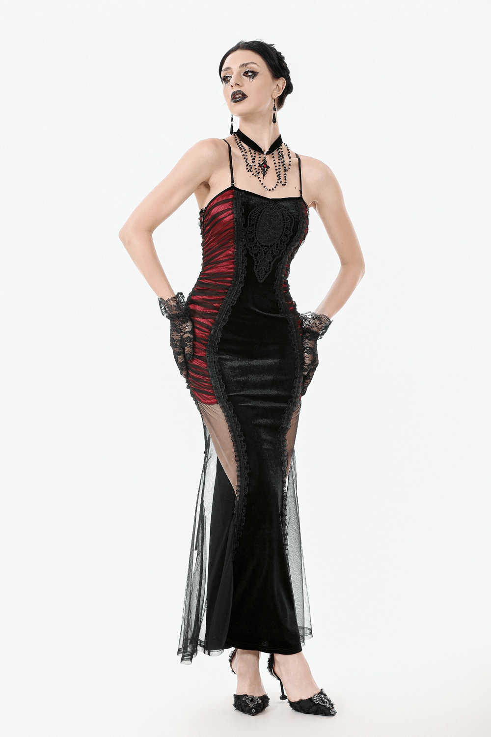 Black and red gothic lace-up maxi dress with sheer sides, accentuated by lace detailing and a daring silhouette.