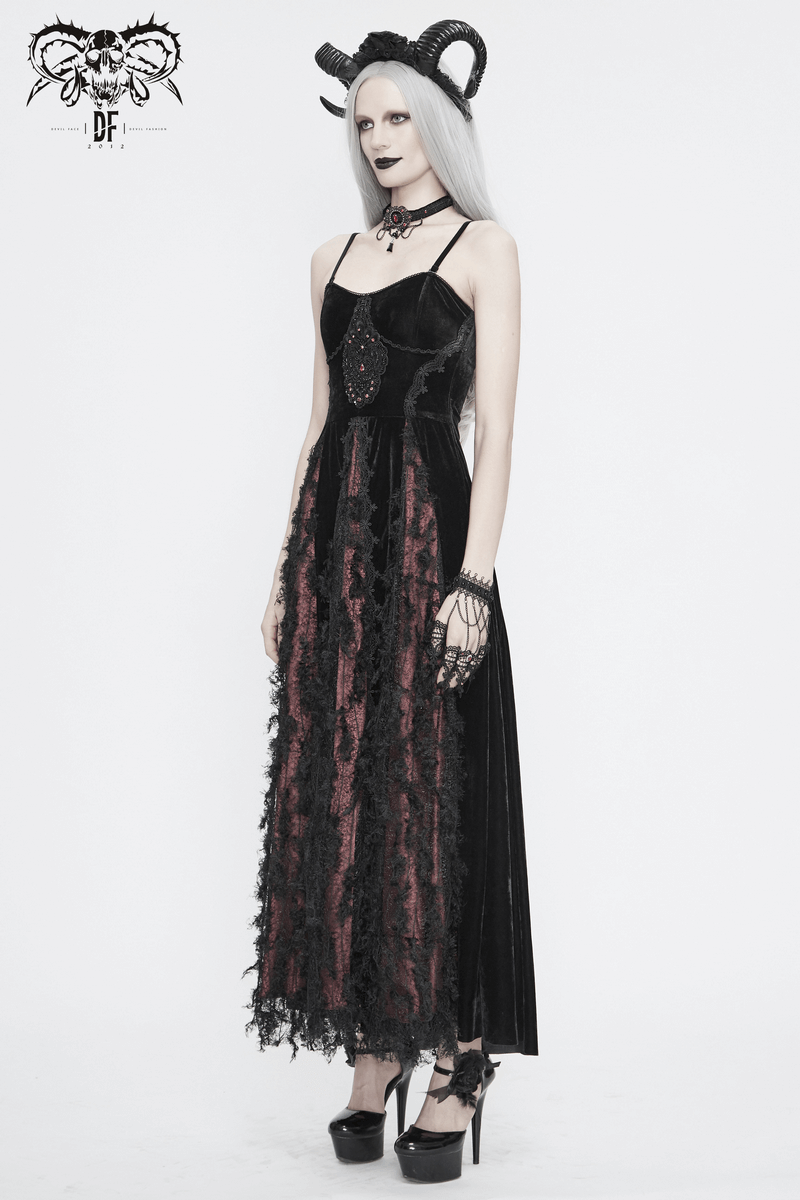 Elegant black and red gothic velvet long dress with lace details, modeled by a woman with striking accessories.