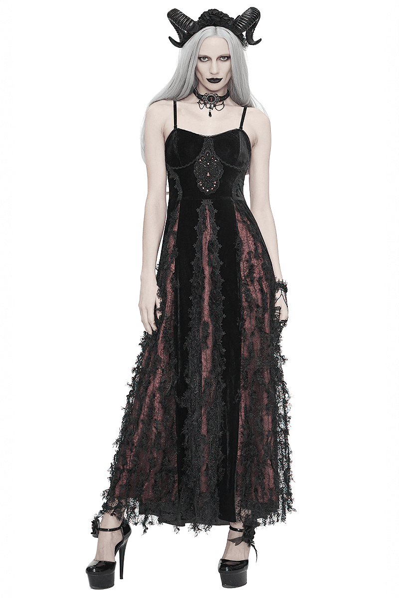 Model wearing a black and red gothic velvet long dress with lace inserts, paired with elegant accessories and a striking hairstyle.