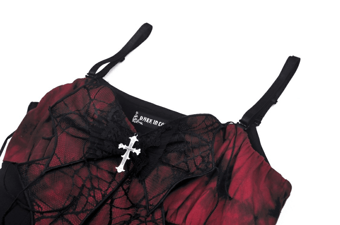 Black and red spiderweb print gothic dress featuring a lace bow and cross pendant, perfect for a daring dark look.