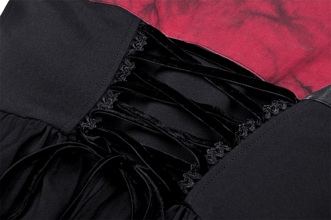 Close-up of the black and red gothic dress showcasing intricate lace-up detail and sweetheart neckline.