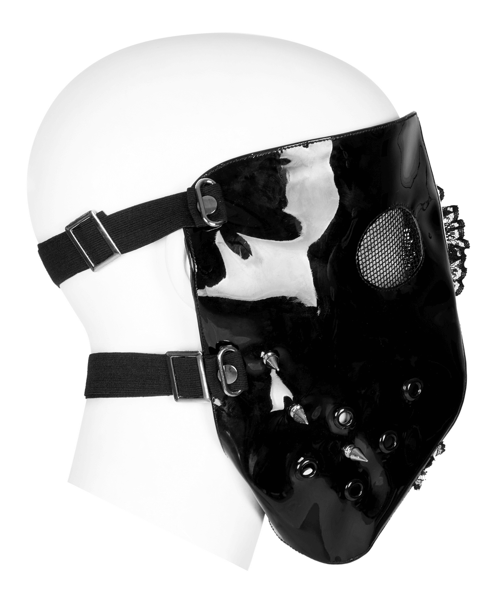 Black and white gothic mask with lace, patent leather finish, adjustable straps, and ventilation holes for comfort.