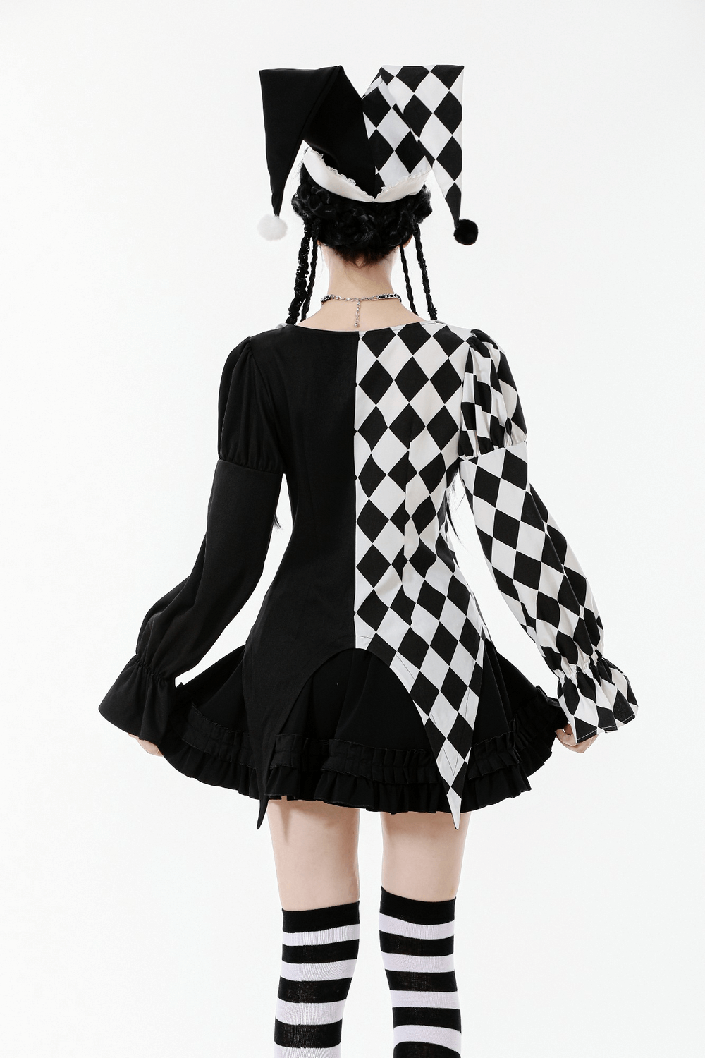 Black and White Harlequin Jester Hat with Lace Trim worn with a playful outfit, showcasing unique patterns and style.