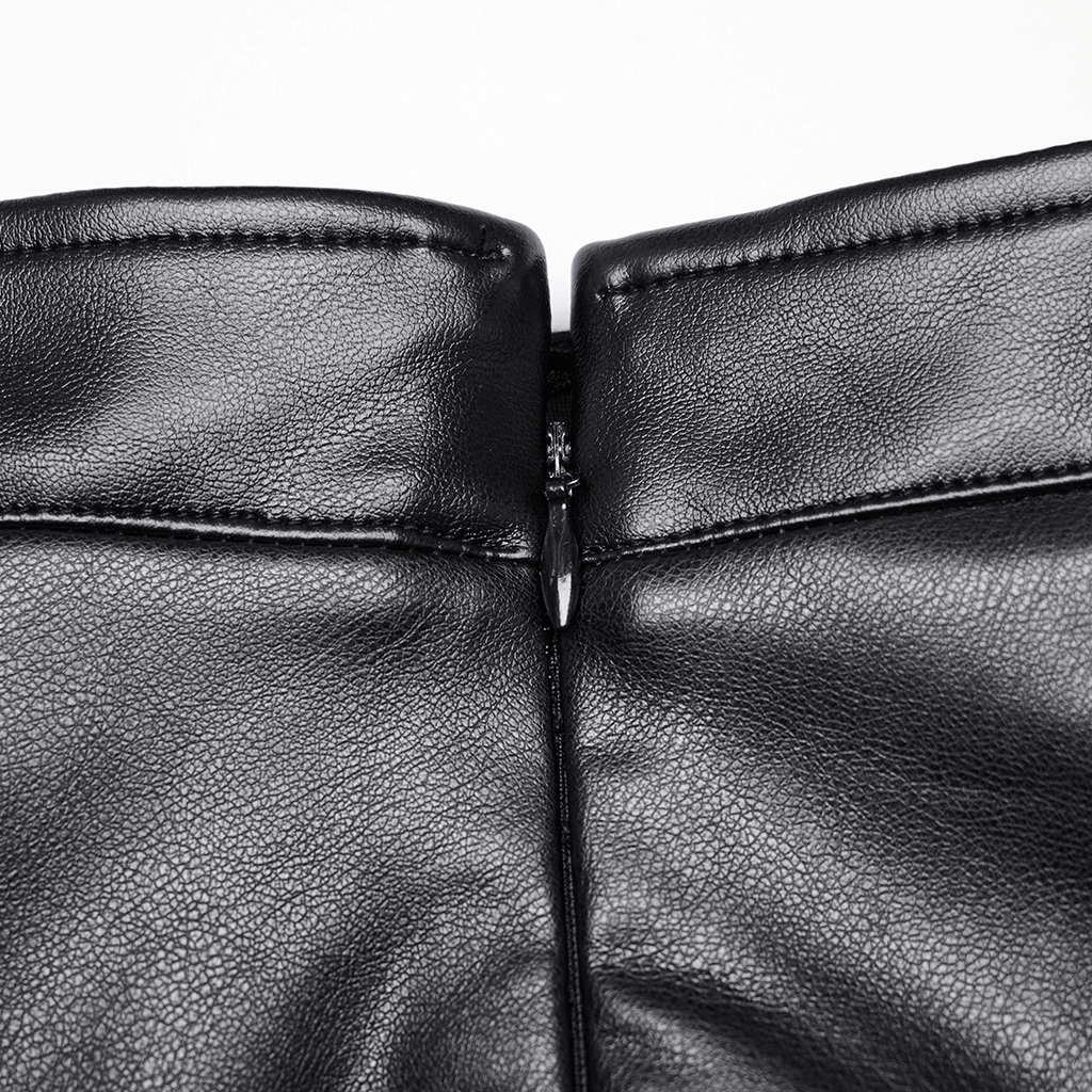 Close-up of side zipper on black artificial leather maxi skirt with eyelet details.