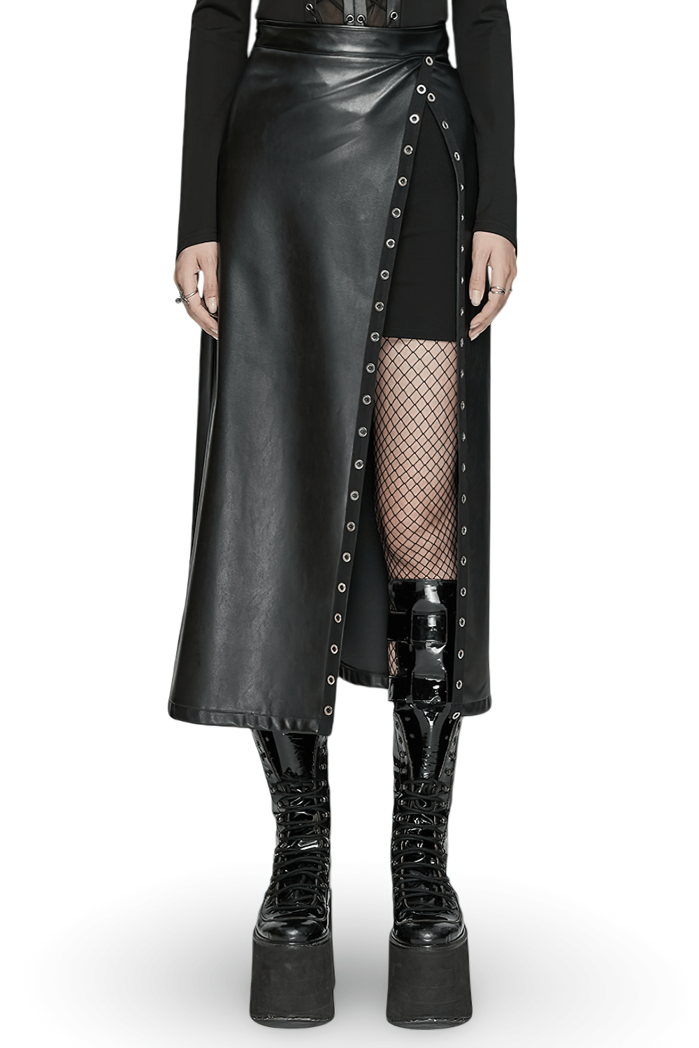 Black artificial leather maxi skirt with diagonal slit and metal eyelets, styled with edgy platform boots.