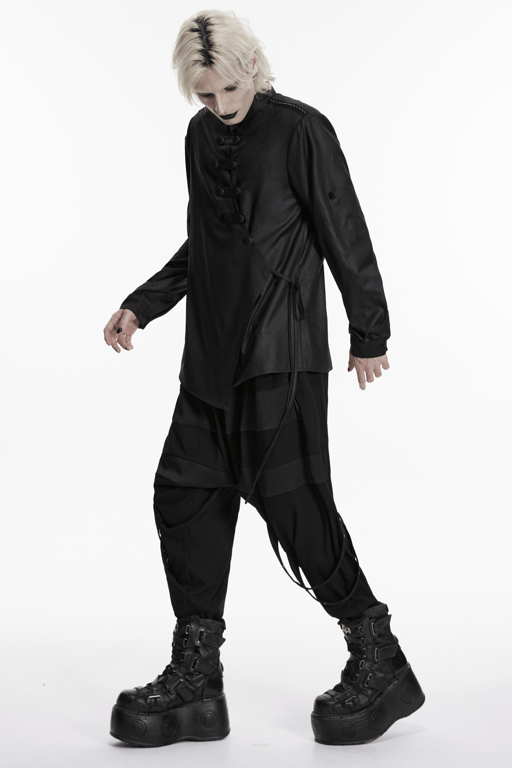 Black Asymmetric Punk Shirt with Hardware Straps worn with stylish black pants and chunky platform boots.