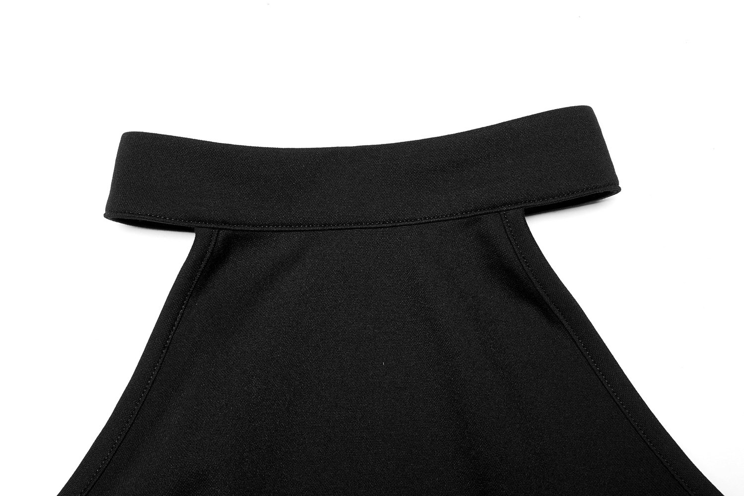 Close-up of the neckline of a black asymmetrical dress with a sleek collar design and smooth fabric texture.