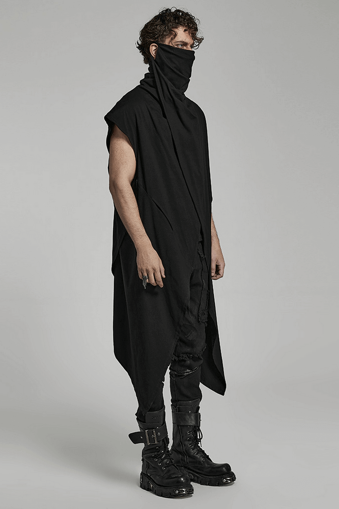 Model wearing a black asymmetrical knit vest with a gothic hem, paired with edgy boots and a face covering.
